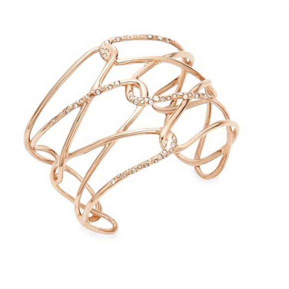 ALEXIS BITTAR
Miss Havisham Liquid Crystal Barbed Cuff
Gold-tone. Signed. Rare. - Picture 2 of 7